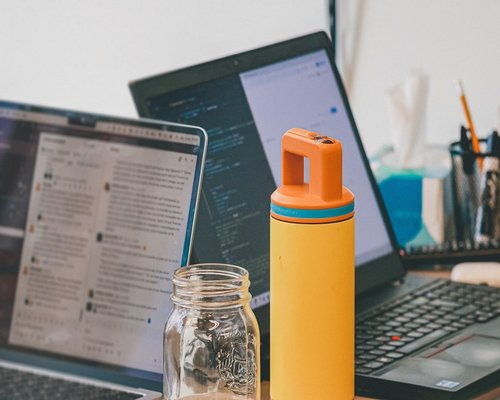 water phone and notebook on a work desk